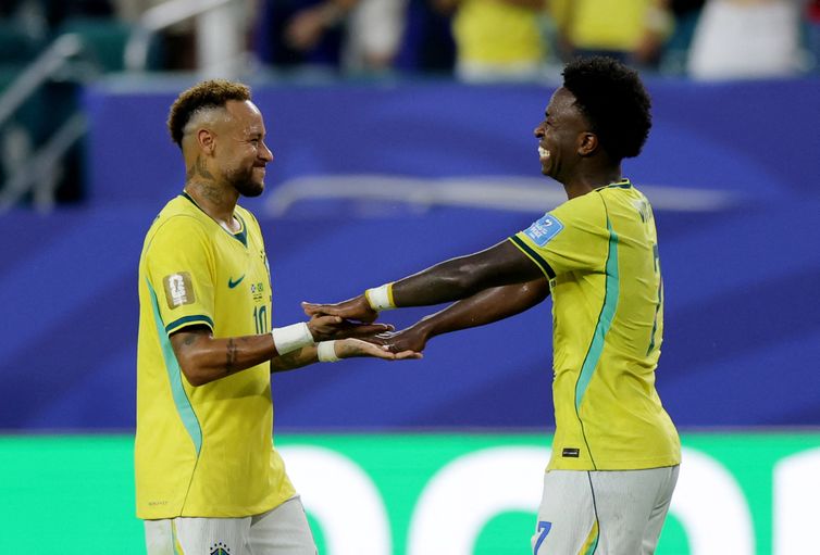 Soccer Football - FIFA World Cup 2026 - Group C - Scotland v Brazil - Miami Stadium, Miami Gardens, Florida, U.S. - June 24, 2026 Brazil's Neymar Jr. and Vinicius Junior celebrate after the match REUTERS/Amanda Perobelli